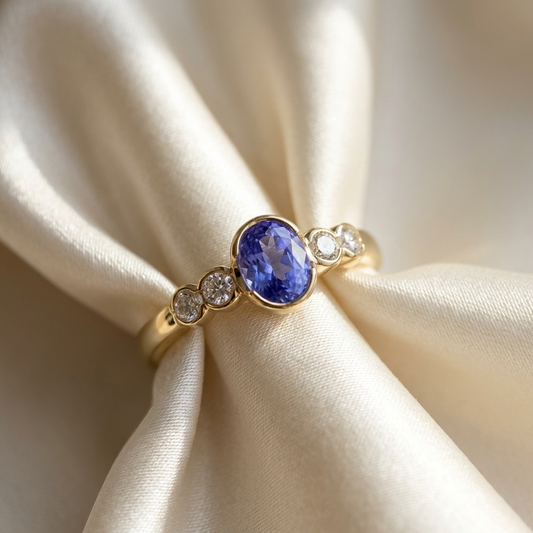 Oval Ceylon sapphire and round diamond ring - side view