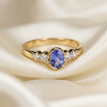 Oval Ceylon sapphire and round diamond ring - angled view