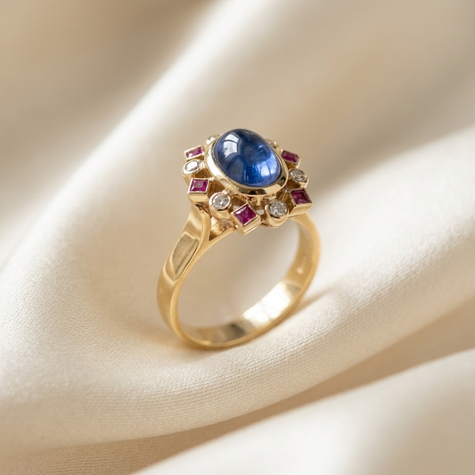 Cabochon Ceylon sapphire, ruby and diamond dress ring - side view