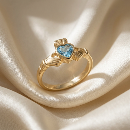 Blue topaz Claddagh dress ring - side view