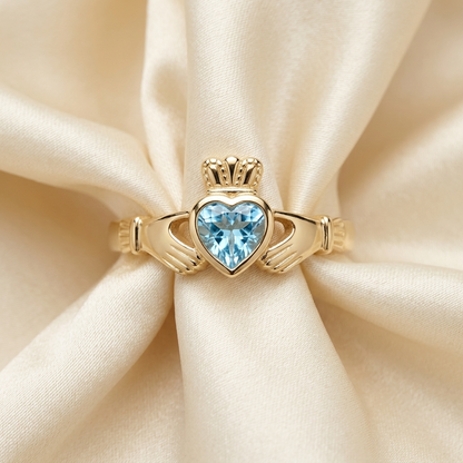 Blue topaz Claddagh dress ring - angled view