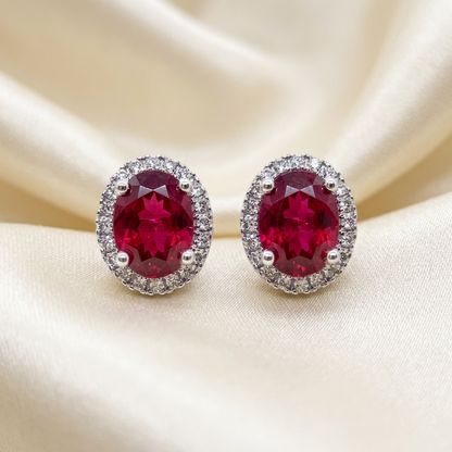 Rubellite and diamond halo earrings