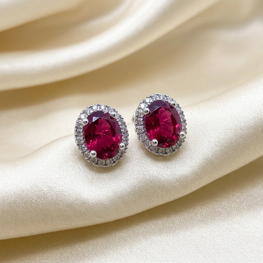 Rubellite and diamond halo earrings - angled view