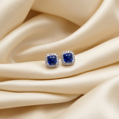 Sapphire and diamond halo earrings - close up