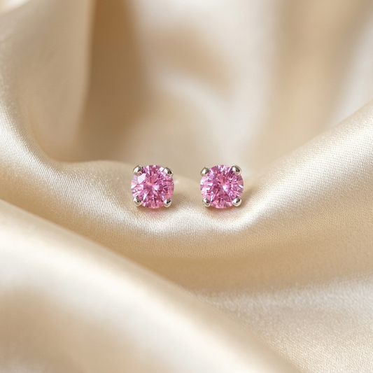 Pink sapphire round stud earrings - angled view