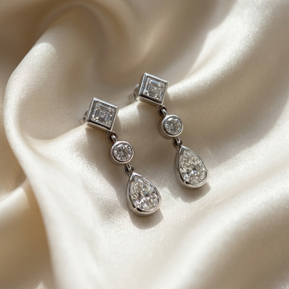 Pear shape and square diamond drop earrings - side view