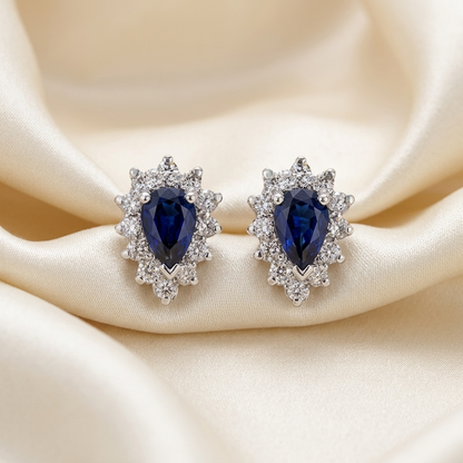 Pear shape sapphire and diamond earrings - angled view