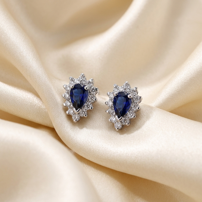 Pear shape sapphire and diamond earrings - detail view