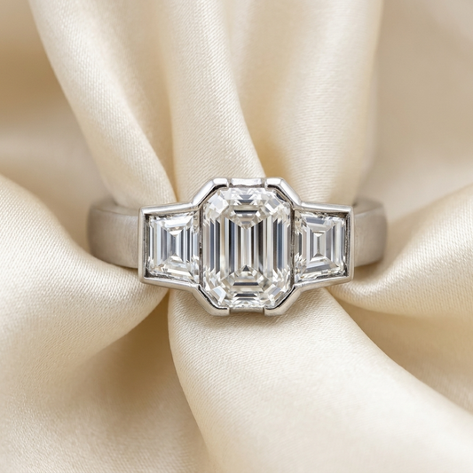 Emerald cut diamond trilogy engagement ring — handcrafted in Sydney
