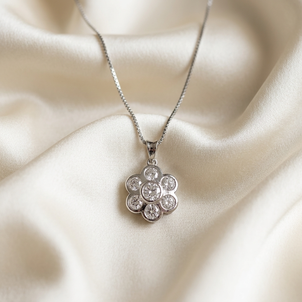 Diamond flower pendant with white gold bail