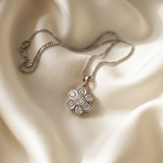 Diamond flower pendant with yellow gold bail - angled view