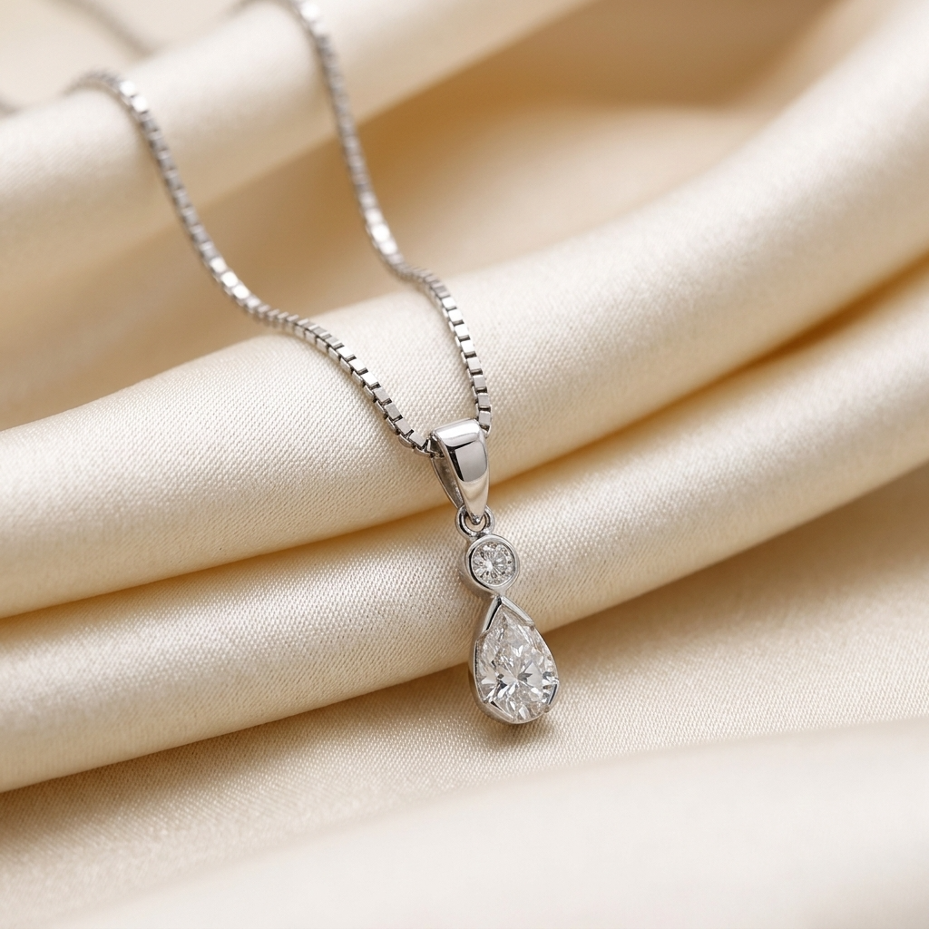 Pear shape diamond pendant with diamond accent - detail view