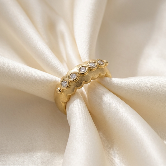Yellow gold ring with marquise diamond detail - side view