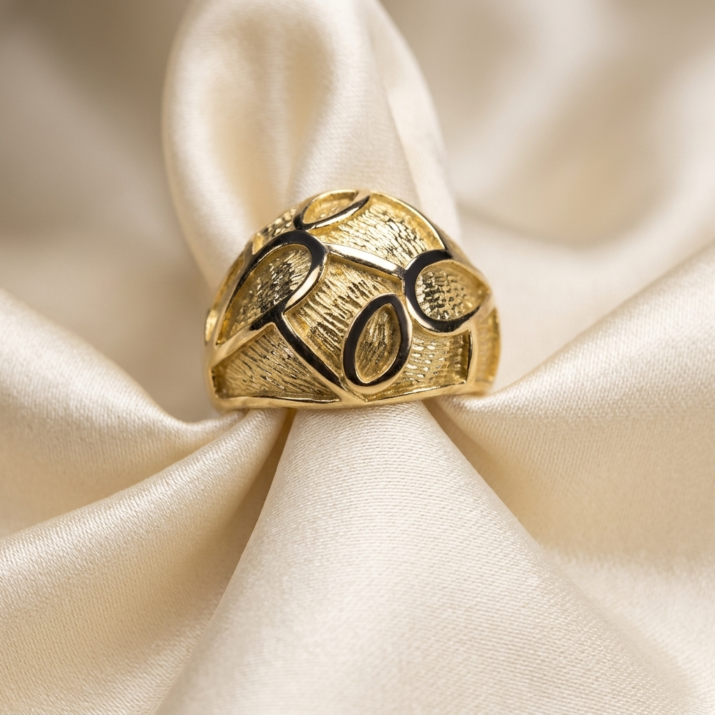 Yellow gold patterned dome ring
