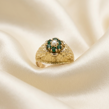 Gold dress ring with emeralds and pearl