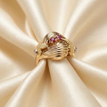 Fancy gold dress ring with rubies