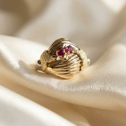 Fancy gold dress ring with rubies - angled view