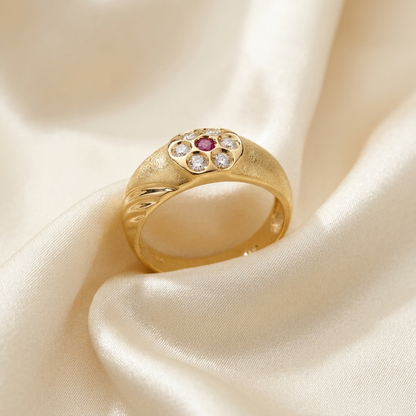 Gold dress ring with diamonds and ruby - angled view