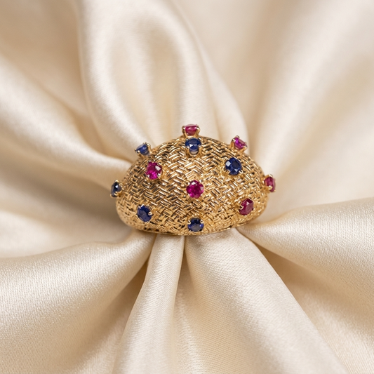 Gold domed basket dress ring set with rubies and sapphires