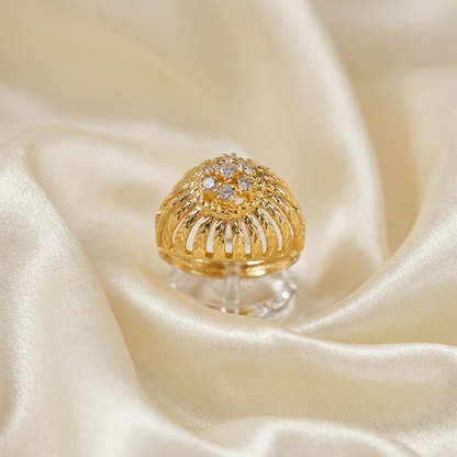 Gold and diamond domed filigree ring - side view