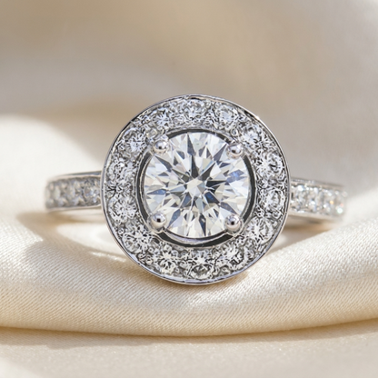 Round brilliant diamond halo engagement ring in 18ct white gold — Diamond Imports Australia. © Diamond Imports 2026