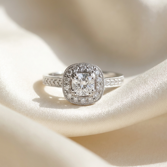 Cushion cut diamond halo engagement ring in 18ct white gold — Diamond Imports Australia. © Diamond Imports 2026