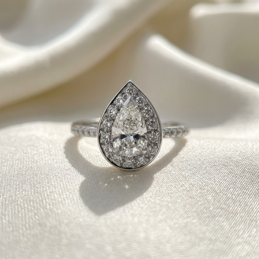 Pear cut diamond halo engagement ring in 18ct white gold — Diamond Imports Australia. © Diamond Imports 2026
