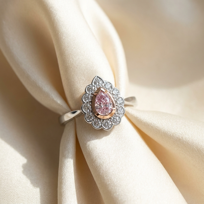 Pear-shaped natural pink diamond halo engagement ring in 18ct pink and white gold — Diamond Imports Australia. © Diamond Imports 2026