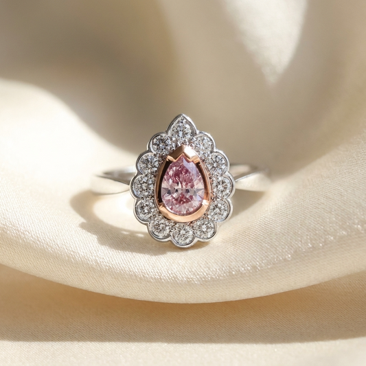 Pear-shaped natural pink diamond halo engagement ring in 18ct pink and white gold — Diamond Imports Australia. © Diamond Imports 2026