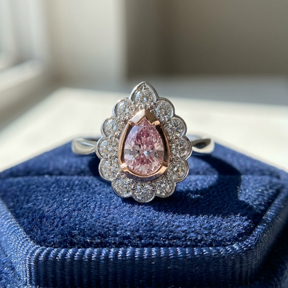 Pear-shaped natural pink diamond halo engagement ring in 18ct pink and white gold — Diamond Imports Australia. © Diamond Imports 2026