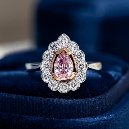 Pear-shaped natural pink diamond halo engagement ring in 18ct pink and white gold — Diamond Imports Australia. © Diamond Imports 2026