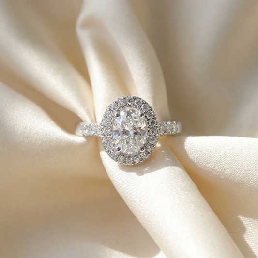 Oval diamond halo engagement ring in 18ct white gold — Diamond Imports Australia. © Diamond Imports 2026
