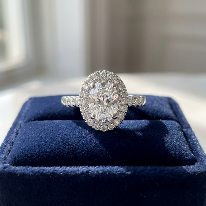 Oval diamond halo engagement ring in 18ct white gold — Diamond Imports Australia. © Diamond Imports 2026