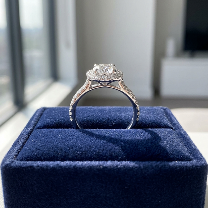 Aster round brilliant diamond halo engagement ring, three quarter view