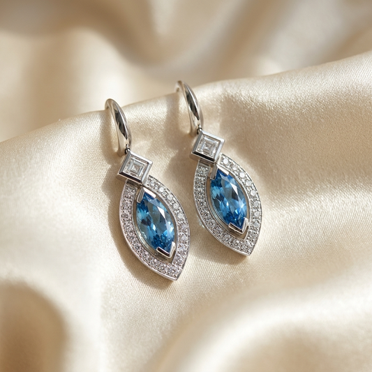 Marquise cut aquamarine and diamond halo drop earrings