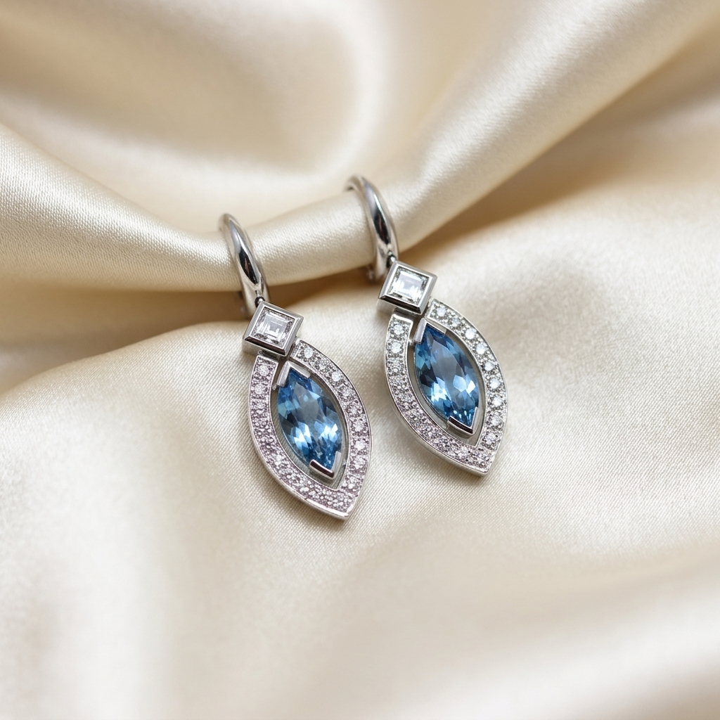 Marquise cut aquamarine and diamond halo drop earrings - detail view