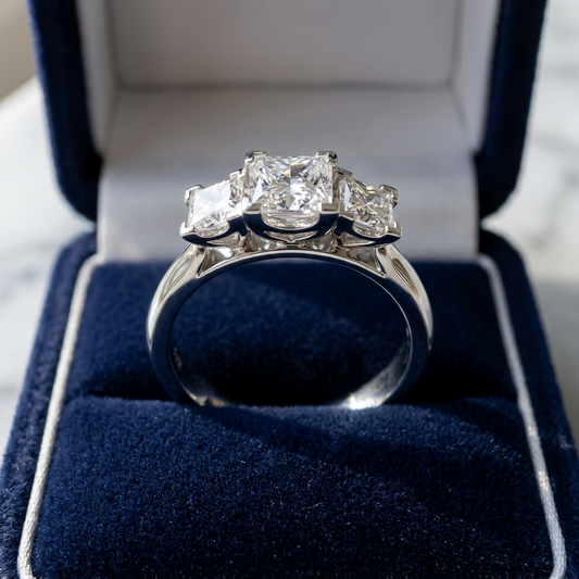 Michelle princess cut diamond three stone engagement ring, angled view