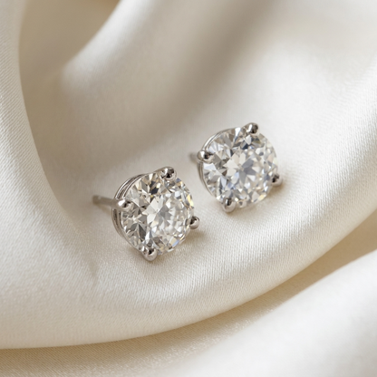 Old mine cut diamond stud earrings in 18ct white gold - angled view