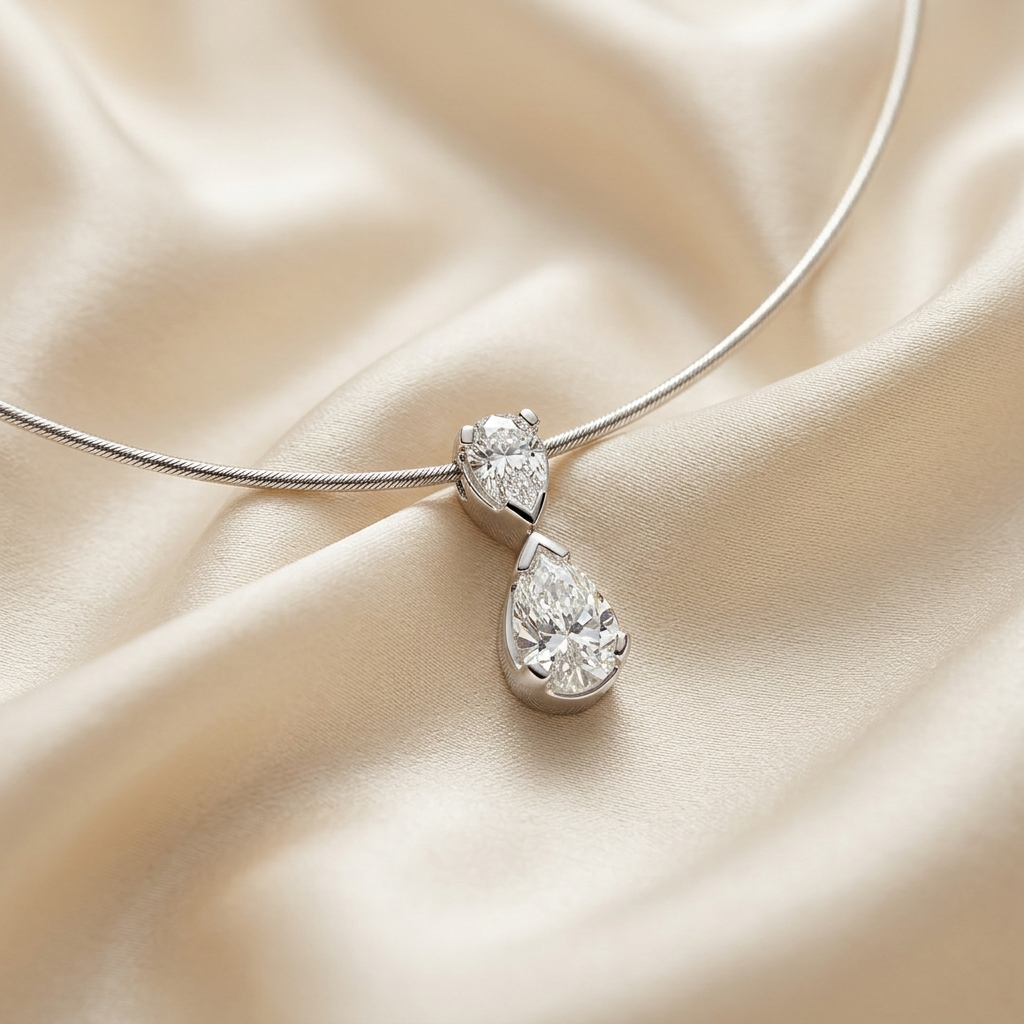 Pear shape diamond duo necklace - two half bezel set diamonds on a cable chain