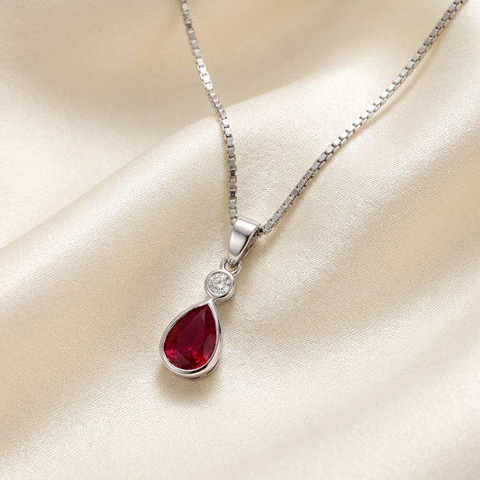 Pear shape bezel set ruby and diamond pendant — handcrafted in Sydney