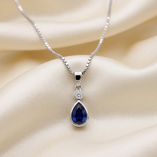 Pear shape bezel set sapphire and diamond pendant — handcrafted in Sydney