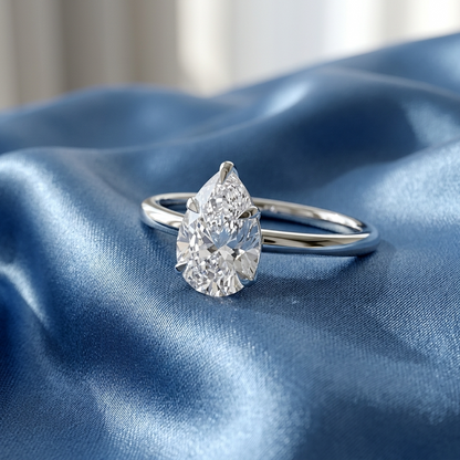 Pear shaped diamond solitaire engagement ring - side view