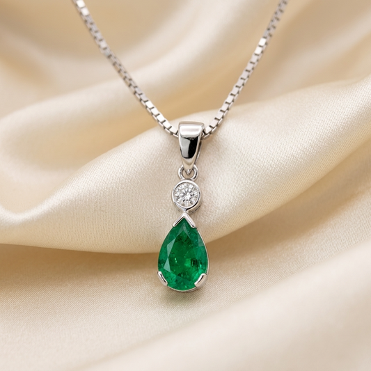 Pear shape emerald and round diamond pendant in white gold — handcrafted in Sydney