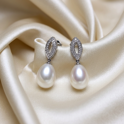 Freshwater pearl and diamond drop earrings in 9ct white gold