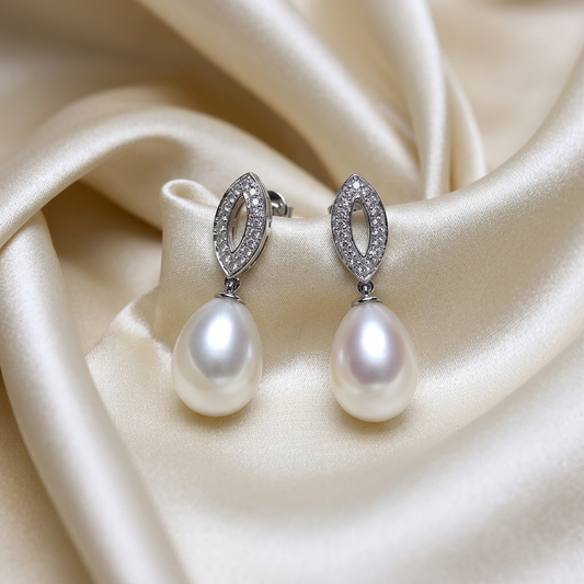 Freshwater pearl and diamond drop earrings in 9ct white gold