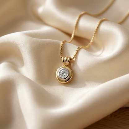Two tone bezel set round diamond pendant - detail view
