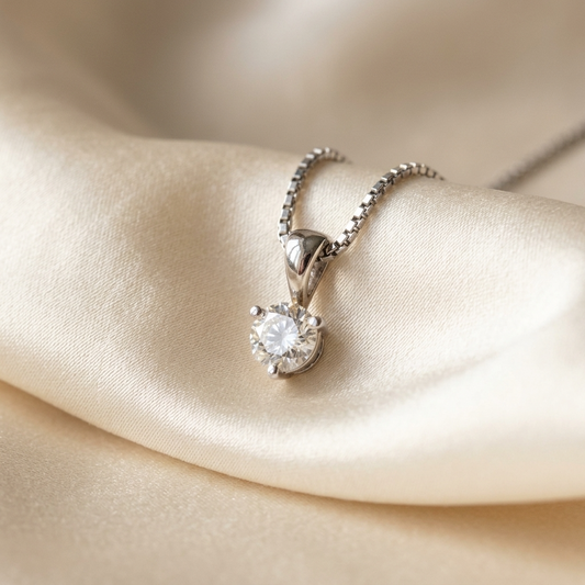 Three claw round diamond solitaire pendant - angled view