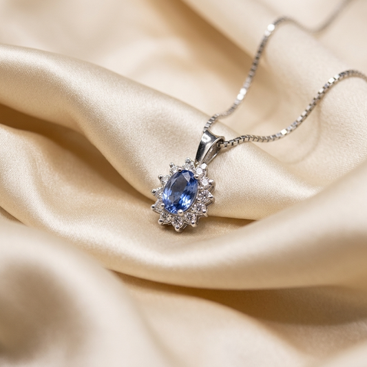 Pear shape sapphire and diamond pendant - angled view