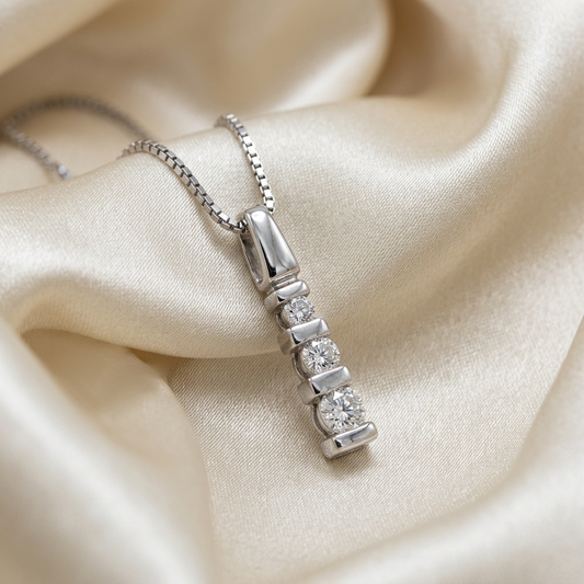 Three stone diamond trilogy pendant - angled view
