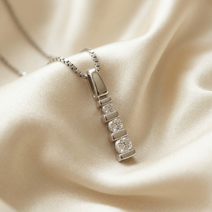 Three stone diamond trilogy pendant - side view